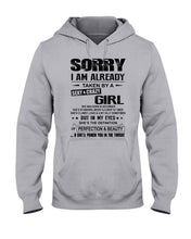 Load image into Gallery viewer, I'm Already Taken By A Sexy And Crazy Girl She Was Born In December Hoodie

