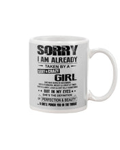 Load image into Gallery viewer, I'm Already Taken By A Sexy And Crazy Girl She Was Born In December Mug
